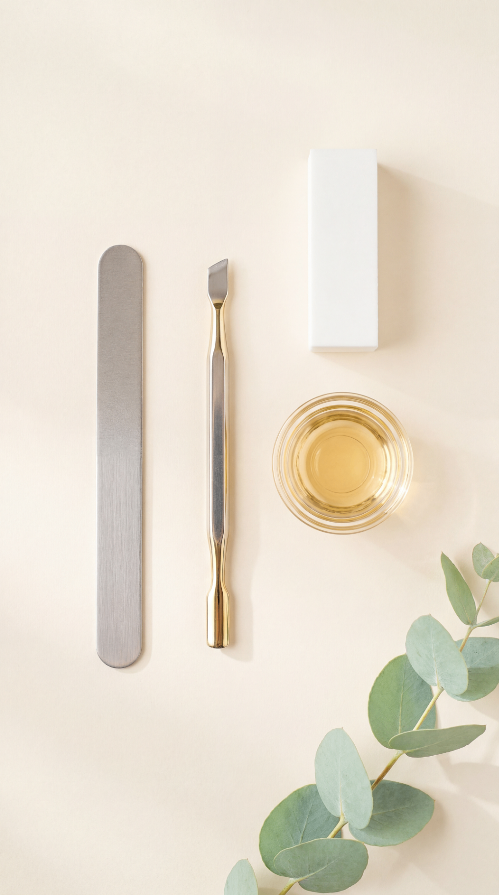 Veloura manicure tools arranged in a refined spa flat lay